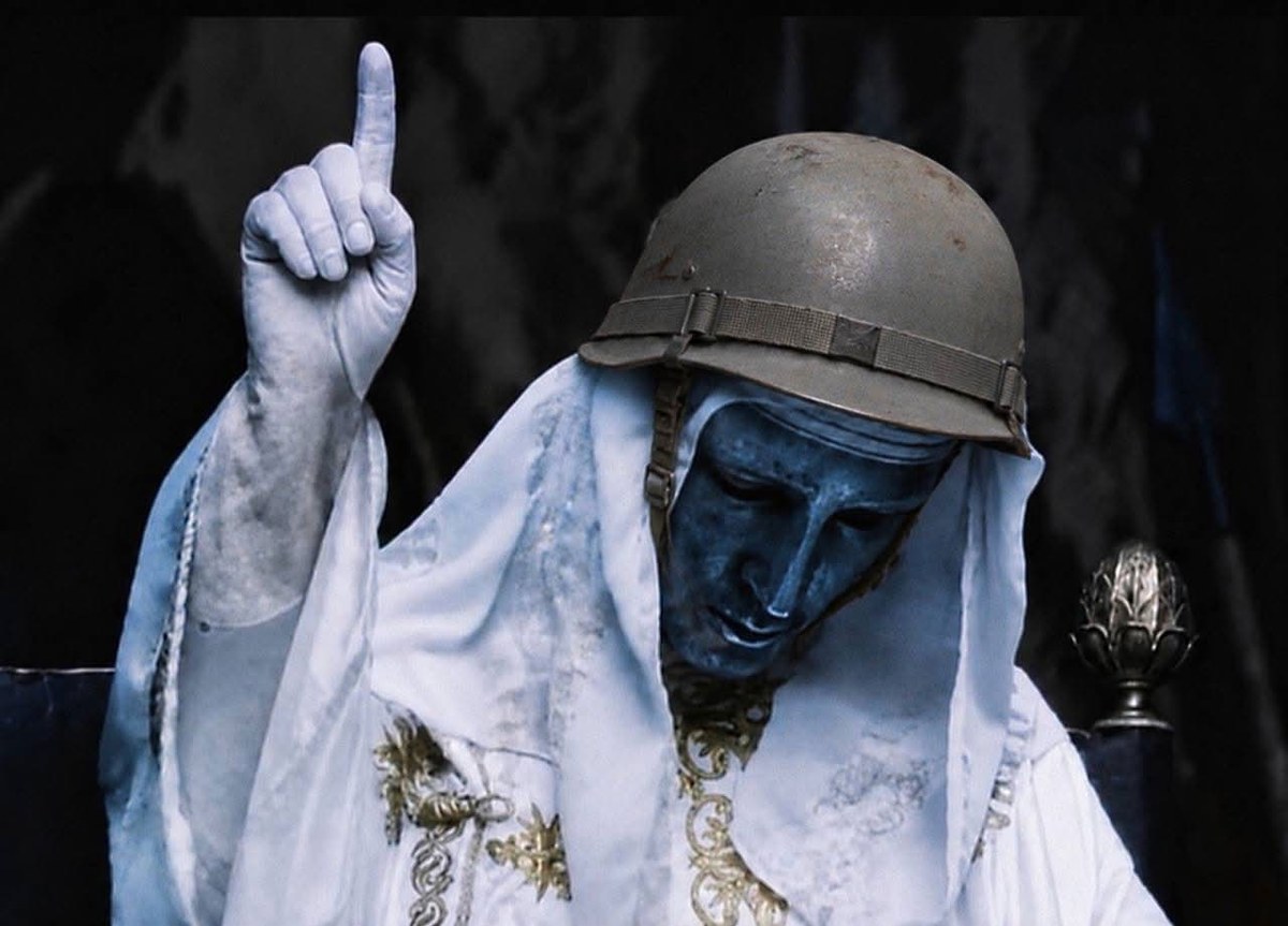 Raised one finger, helmet